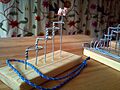 Staircasepuzzle-4ringspluspolewithcat
