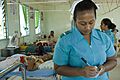 Trainee nurse Tekanrati Tito at South Tarawa Hospital, Kiribati 2007. Photo- Lorrie Graham (10730691373)