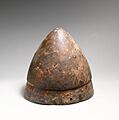Bronze helmet of conical shape MET DP21094