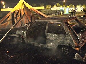 Archivo:Coche quemado en Festimad 2005