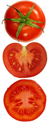 Archivo:Tomatoes plain and sliced