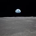 Earth Rises Over Lunar Horizon (AS11-44-6553)