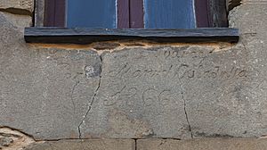 Archivo:Inscripcion puerta casa pendonistas Albares de la Ribera