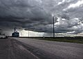 Ominous clouds above Pine Bluffs, a small farming community on the Nebraska border in Laramie County, Wyoming LCCN2015632936