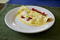 Omelette with butter and tomatoes