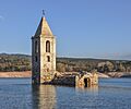 Vilanova de Sau. Old church of Sant Romà de Sau, submerged under the waters of Sau reservoir. 11th Century and later additions (26286517166) edited