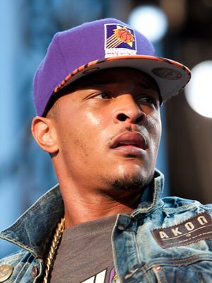 T.I. performing in concert, wearing a Phoenix Suns cap (cropped).jpg