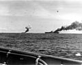 USS Franklin (CV-13) and USS Belleau Wood (CVL-24) afire 1944