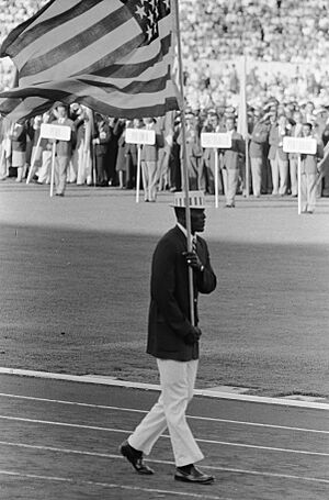 Archivo:Olympische Spelen te Rome Opening USA vlaggendrager, Bestanddeelnr 911-5404