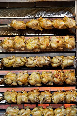 Archivo:Madrid - Fiestas de San Isidro - Pollo rostizado - 20070515-59
