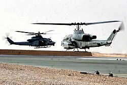 Archivo:AH-1W UH-1Y take off from Bastion Afghanistan 2009