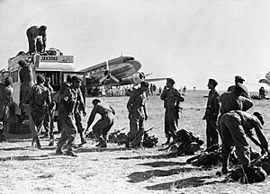 Indian soldiers landing at Srinagar airfield during the 1947–1948 war.jpg