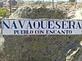 Cartel de Navaquesera, a la entrada del pueblo