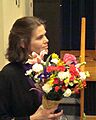 Daphne Koller with flowers (portrait)