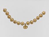 Gilt terracotta ornaments from a necklace MET DP145718