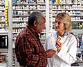 Man consults with pharmacist (2)