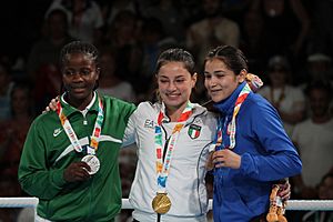 Archivo:Victory Ceremony Girls' flyweight Boxing 2018 YOG 40