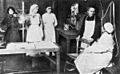 Marie Curie with nurses and physician