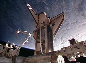 Archivo:STS-133 docked to ISS