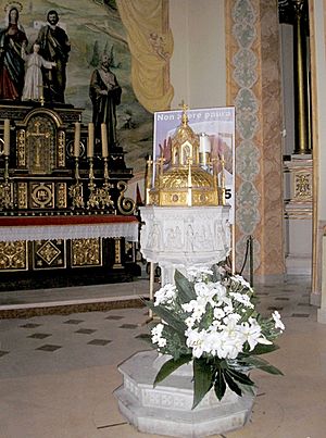 Archivo:The holy water stoup in Wadowice Poland where the Pope J.Paul.II received the baptism