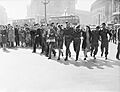Civilians and service personnel in London's Picadilly Circus celebrate the news of Allied Victory over Japan in August 1945. D25636