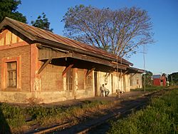 Laguna Blanca (Chaco) train station seen from the railway.jpg