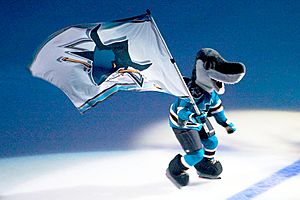Archivo:Sharkie with flag