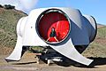 Size comparison child in wind turbine rotor hub without blades (enercon e-70)