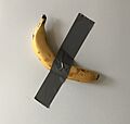 Banana duct taped to fridge as a reminder to eat less meat