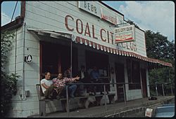 COAL CITY CLUB IN COAL CITY, WEST VIRGINIA, A PART OF BECKLEY ALL OF THE MEN ARE COAL MINERS. NOTE THAT SOME OF THEM... - NARA - 556612.jpg
