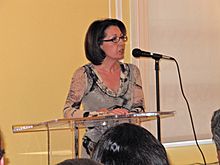 Author Marie Arana speaking at Peruvian Embassy in Washington, DC in 2010 (photo by Mary Ishimoto Morris).jpg