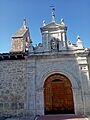 Fachada y portada Iglesia de San Miguel Arcángel en Villacienzo (Burgos)