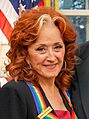 Bonnie Raitt on December 8, 2024 in the White House Oval Office (cropped)