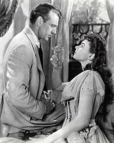 Archivo:Gary Cooper and Ingrid Bergman in Saratoga Trunk 1945