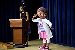 Michelle Obama with Dottie "Doc" McStuffins, 2014.jpg