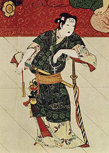 Archivo:Okuni with cross dressed as a samurai
