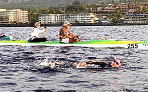 Archivo:Ultraman Swimmer with the required escort