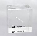 An acrylic cube specially prepared for element collectors containing an ampoule filled with liquefied xenon