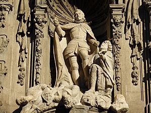 Archivo:Escultura de San Fernando en la fachada barroca del Museo de Historia de Madrid