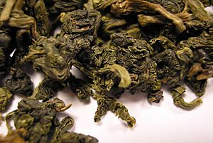 Archivo:HGY Oolong tea leaf close