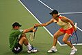 Martina gives Bob Bryan a hand