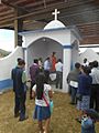 14 San Juan visitando una capilla posa en el atrio de San Juan Achiutla