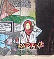 Bethlehem wall graffiti Razan with flower cropped