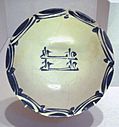 Iraq tin glazed earthenware with blue and white decoration 9th century