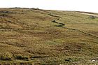 Dique Funzie Girt en la isla Fetlar de las Islas Shetland. Divide a la isla en dos, probablemente, desde el Neolítico.