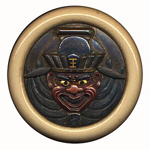 Archivo:Kagamibuta netsuke front