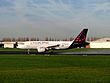 Brussels Airlines A319-112 (OO-SSG) landing at Brussels Airport (4).jpg