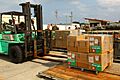 US Navy 110312-M-KA277-020 Marines assigned to III Marine Expeditionary Force (III MEF) load humanitarian assistance supplies and personnel aboard