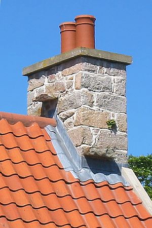 Archivo:Witches' stones on tiled roof Jersey
