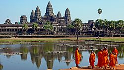 Buddhist monks in front of the Angkor Wat.jpg